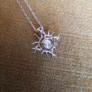 Sunburst Vantel pearl sunburst cage necklace